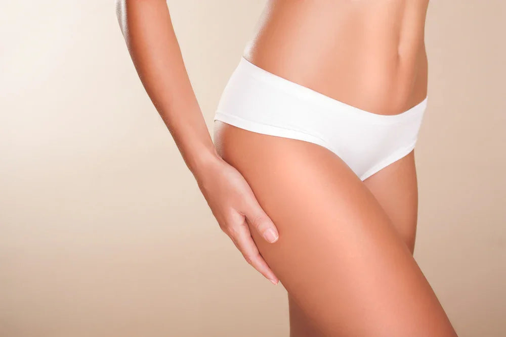 Woman wearing white organic cotton underwear for sensitive skin