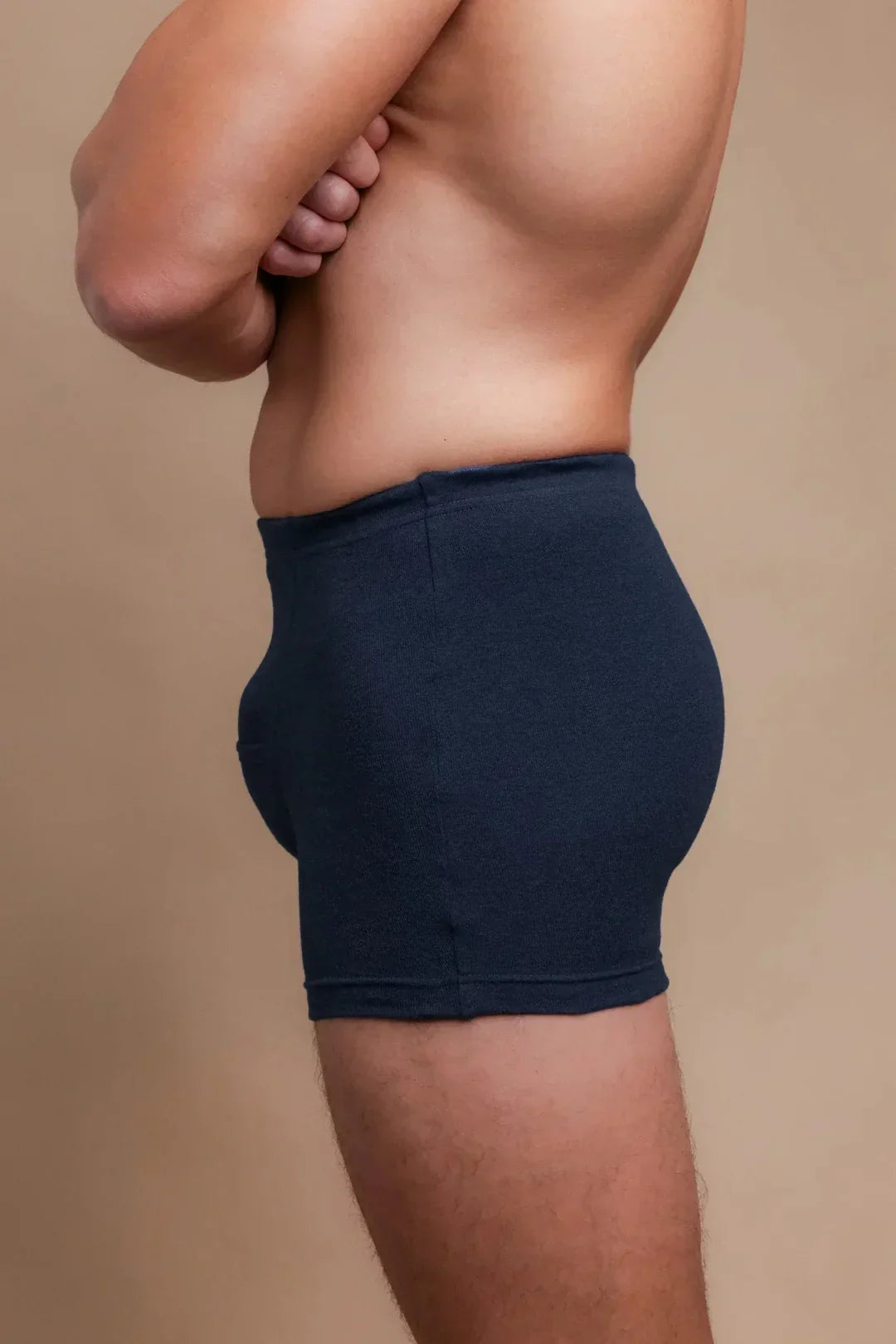 Side view of person wearing dark allergy-friendly organic cotton boxer briefs
